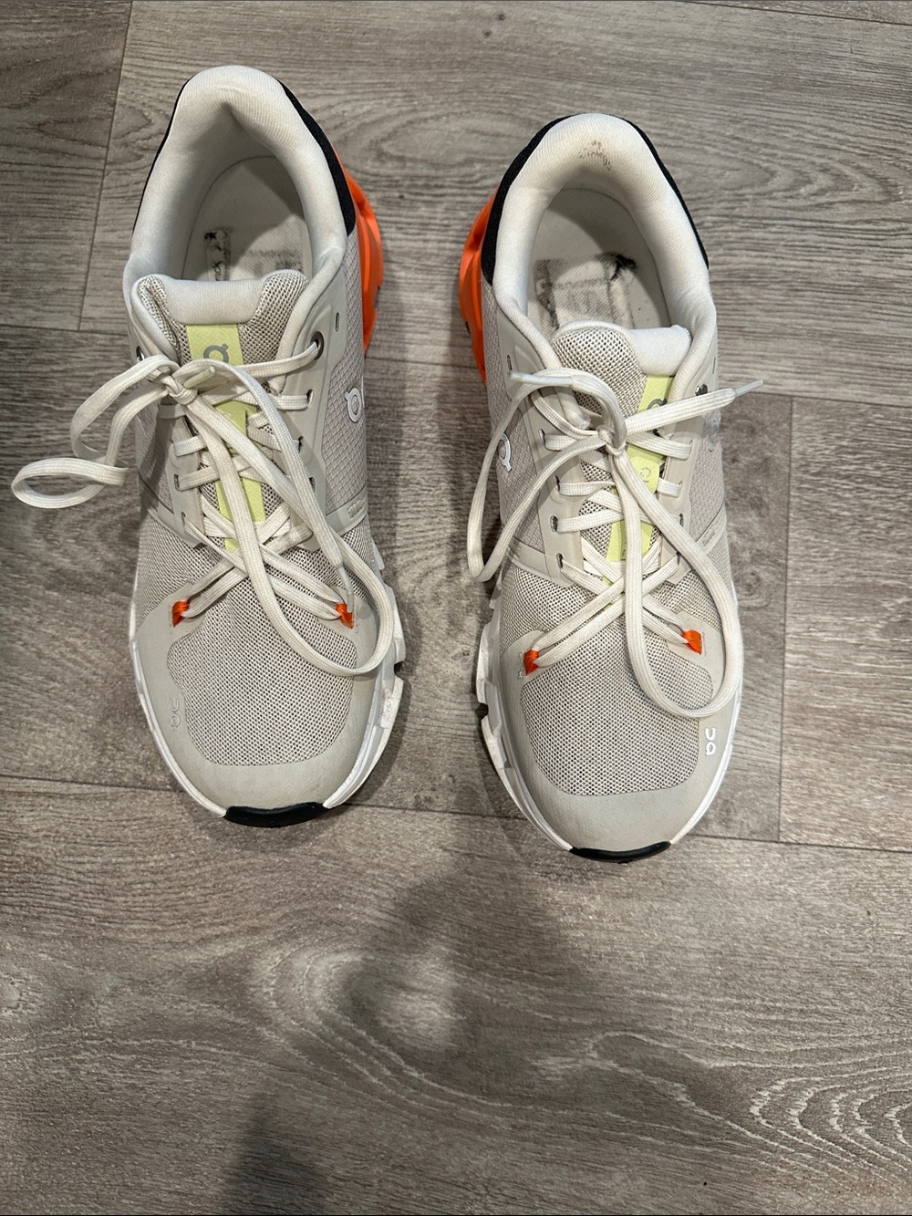 On Running Beige White Sneakers with Orange Heel Detail